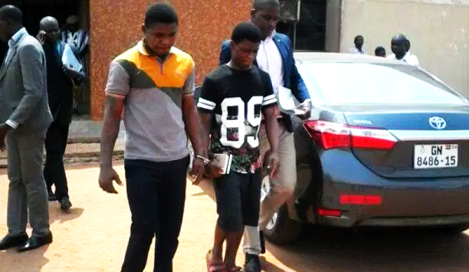 Daniel Asiedu (middle) and Vincent Bosso (left) being led out of the court premises Daniel Asiedu (middle) and Vincent Bosso (left) being led out of the court premises